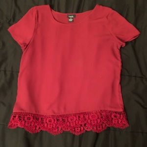 Red blouse with lace trim